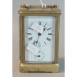 French brass carriage clock with full depth Roman dial, having subsidiary face. 2 train movement.