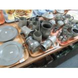 Three trays of assorted pewter ware, to include: plates, tankards, teapot and coffee pot with