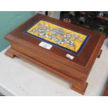 Hardwood jewellery box with hinged cover, inset with a Fiance hand painted tile, bearing signature C