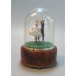 A Reuge Swiss musical automaton of a dancing couple, marked to the base Dr Zhivago 'Lara's