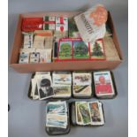 A large collection of cigarette cards, some in tobacco tins, to include: transport, The Beatles,