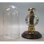 20th century Hermle skeleton clock, with glass dome on wooden base. (B.P. 21% + VAT)