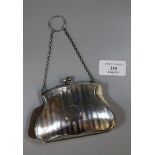 Edwardian design silver engine turned ladies' purse with chain and ring holder. (B.P. 21% + VAT)