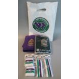 A bag of assorted Wimbledon promotional items: headbands, etc. (B.P. 21% + VAT)
