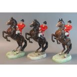 3 Beswick huntsmen in red jacket and black cap on rearing horse, impressed marks to the base 868 (3)