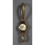 Ladies gold small head Buren 18 jewel Swiss wrist watch on gold plated expanding bracelet. (B.P. 21%