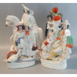 Collection of four 19th century Staffordshire flatback figurines to include two spill vases with