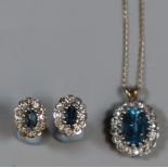 Garniture of gold jewellery to include pendant and matching stone set earrings. (3) 6.5g approx. (