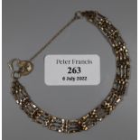 Unmarked gold gate bracelet with padlock. 4.9g (B.P. 21% + VAT)
