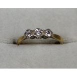 18ct gold 3 stone illusion set diamond engagement ring 3g approx size P. Cased. (B.P. 21% + VAT)