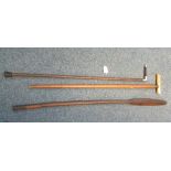Two vintage walking sticks/canes, one with silver mounts in bamboo finish, together with tribal