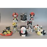 A collection of 7 Lorna Bailey novelty china cats, all appearing signed to the bases together with