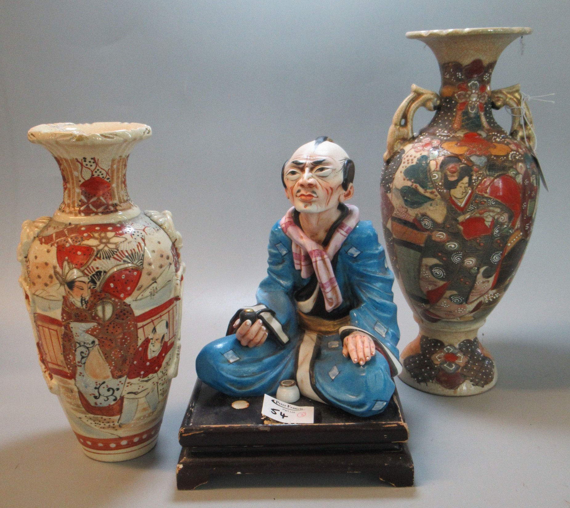 2 similar Japanese Satsuma vases together with a study of a seated oriental man with pipe on