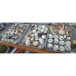 Three trays, two with a collection of pill boxes and other lidded boxes including Aynsley,