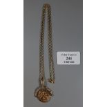9ct gold year 2000 spinning fob together with a 9ct gold chain. 5.4g approx. (B.P. 21% + VAT)