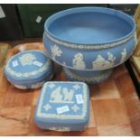 Three pieces of Wedgwood blue and white Jasperware, to include: a large pedestal bowl, and 2