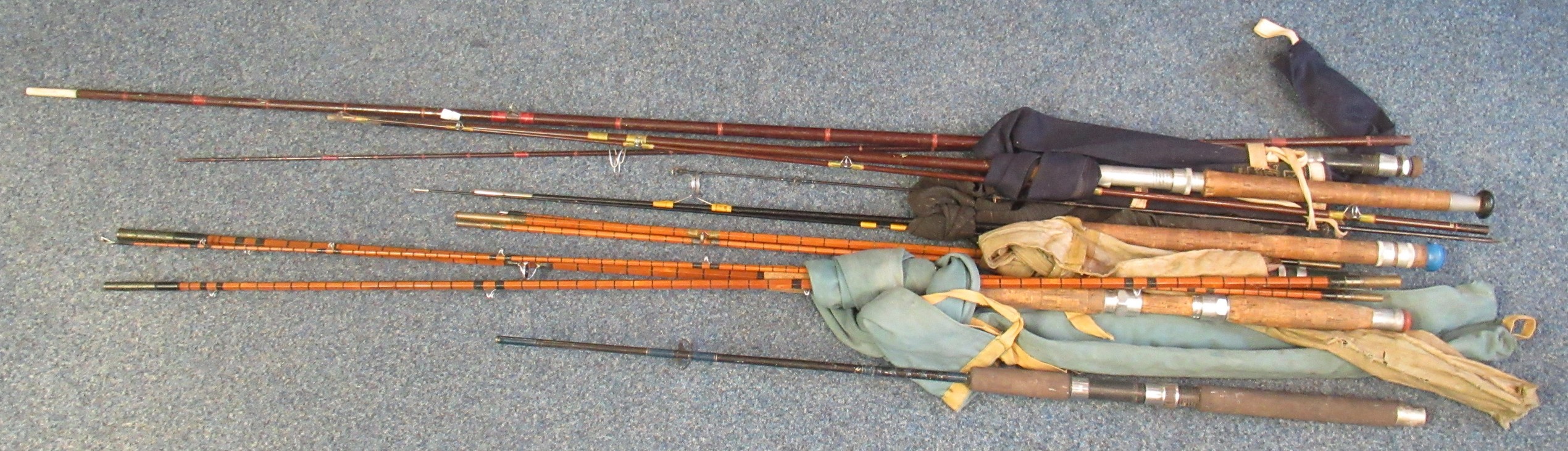 Box of assorted vintage and other split cane and carbon fishing rods, including a hardy two piece
