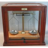 W & J George & Becker Ltd chemical balance or laboratory scales in fitted wooden glass case. (B.P.
