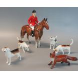Beswick style huntsman in red jacket and black cap on horseback, together with four Beswick