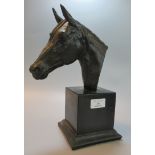 A Bronzed horse head bust on square plinth, appearing to be signed Ormond? (B.P. 21% + VAT)