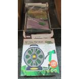Box of gardening items: bench cover, round patio set cover, 50inch/15mm flat hose with spray nozzle,