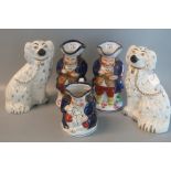 Pair of Beswick fire side seated spaniels with painted features together with three Allertons toby