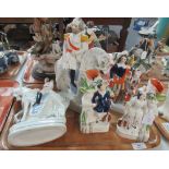 Five Staffordshire flatback figurines, 2 equestrian figures, 2 spill vases with musicians and a