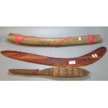 Souvenir Wooden Australian Boomerang together with a Rainmaker and another wooden implement (3) (B.