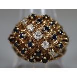 9ct gold diamond and sapphire cluster ring. Ring size Q. Approx weight 8g. (B.P. 21% + VAT)