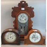 Early 20th century Ansonia two train Gingerbread type mantle clock together with two hat shaped