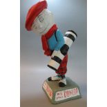 A Dunlop Caddy Golf ball Advertising Figure on naturalistic base, inscribed 'We play Dunlop' 37cm