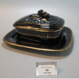 Victorian black and gilded ground sardine box and cover on fixed stand. (B.P. 21% + VAT)