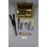 Collection of assorted ladies' manicure items in bone, mother of pearl with glove stretchers etc. (