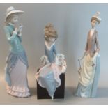 3 large Lladro Spanish porcelain figurines of Edwardian women, one reading a book, one with a