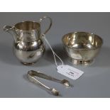 Silver baluster cream jug with Birmingham hallmarks, together with silver pedestal bowl or sucrier