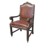 Late 19th early 20th century carved oak carver chair, the shaped back with carved frieze above a