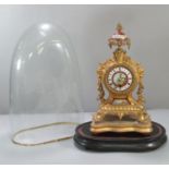 19th century French gilt metal porcelain mounted balloon shaped mantle clock, having urn shaped