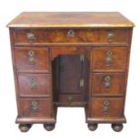 18th century walnut ladies' knee hole desk, the moulded and inlaid top above a single drawer central