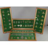 A good collection of British military cap-badges in five frames with descriptive keys verso. 78