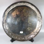 Arts and Crafts design hammered silver shallow tray or charger of circular form, the borders with