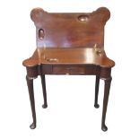18th century mahogany fold-over card table, the hinged lid and shaped top above a single drawer