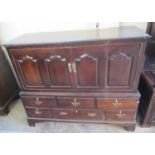 Early 19th Century Welsh oak two stage press cupboard of low proportions, the moulded top above