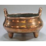 Heavy Chinese baluster shaped bronze censer, with two loop handles on three short feet. Impressed