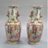 Pair of late 19th century Chinese Canton porcelain Famille Rose decorated baluster shaped vases with