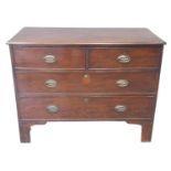 19th century mahogany straight front chest of two short and two long drawers, standing on bracket