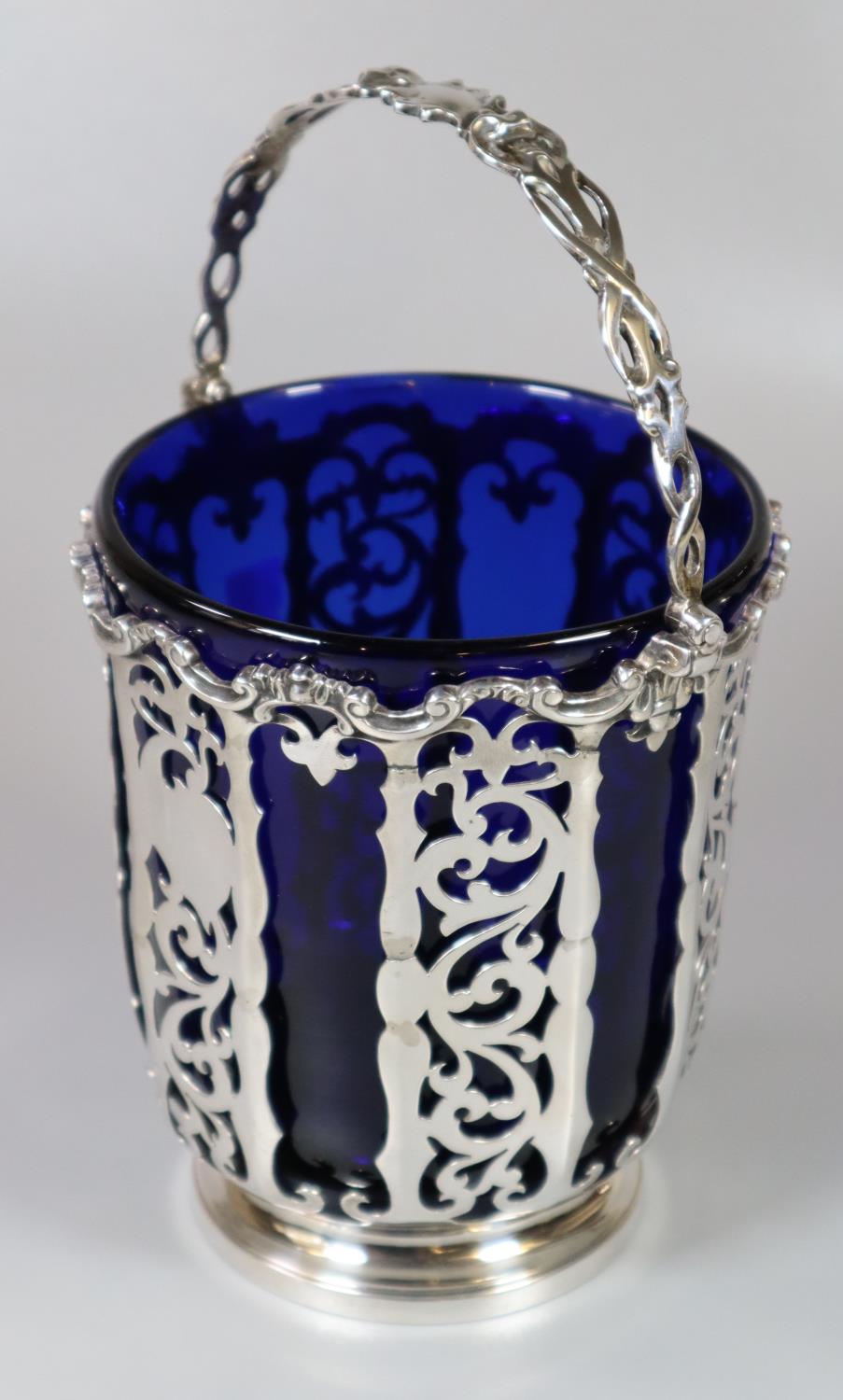 Victorian silver and pierced basket with swing handle and Bristol Blue glass liner by George John - Image 2 of 2