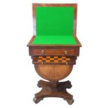 A Victorian rosewood inlaid swivel games table and work box. The folding card table with hinged