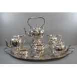 Victorian Elkington & Co silver plated tea service embossed with foliate designs, to include: Spirit
