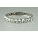 A diamond full eternity ring. Ring size O. Approx weight 3.7 grams. (B.P. 21% + VAT)