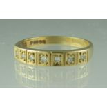 A diamond half eternity style ring set in 18ct gold. Ring size M & 1/2. Approx weight 2.7 grams. (